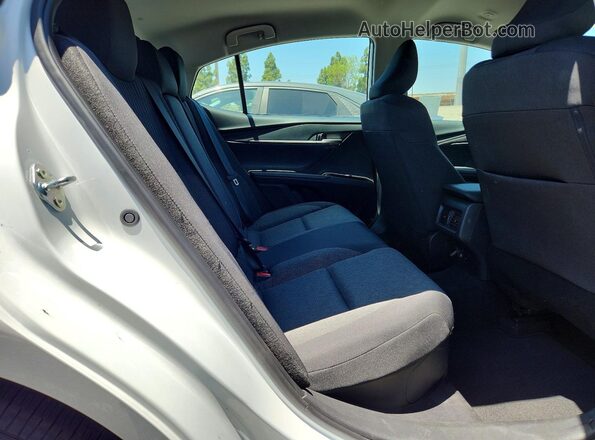 4T1DAACK0TU675079 2026 TOYOTA CAMRY White Rear seats view