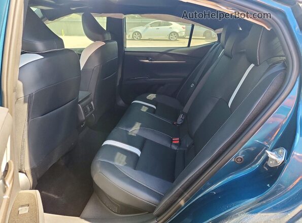 4T1DAACK2TU290963 2026 TOYOTA CAMRY Blue Vista de los asientos traseros