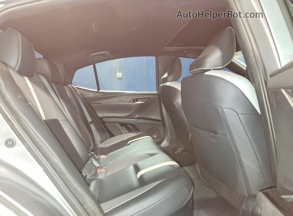 4T1DAACK3SU559258 2025 TOYOTA CAMRY Silver Vista de los asientos traseros