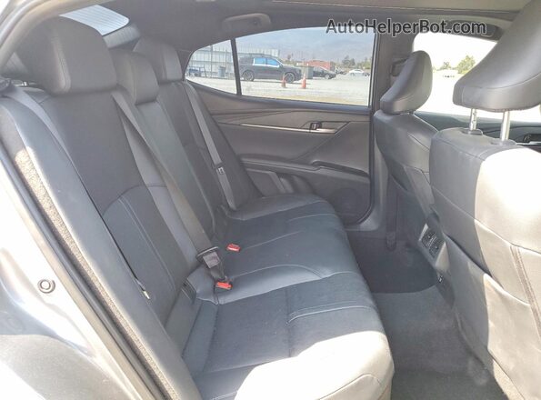 4T1DAACK5SU632257 2025 TOYOTA CAMRY Charcoal Vista de los asientos traseros