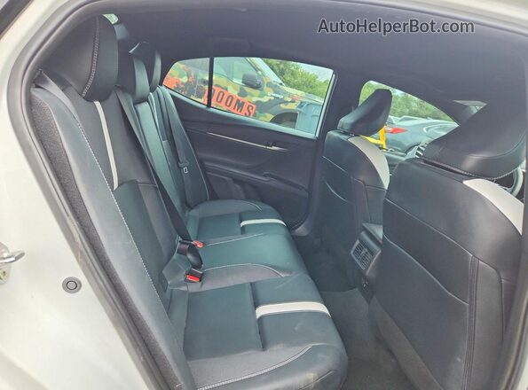 4T1DAACK7SU083192 2025 TOYOTA CAMRY White Vista de los asientos traseros