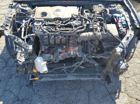 4T1DAACK7SU543368 2025 TOYOTA CAMRY Black Vista interior trasera