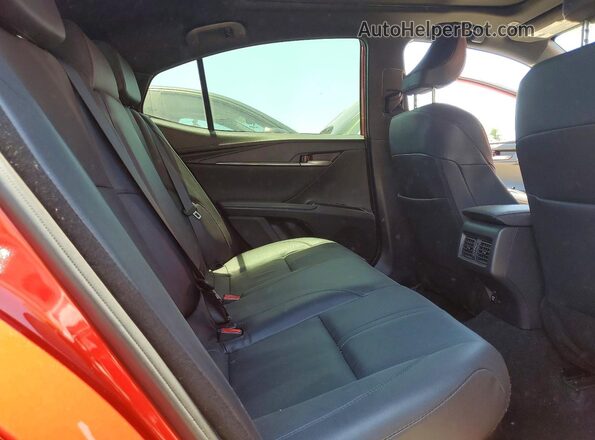 4T1DAACK9SU050193 2025 TOYOTA CAMRY Red Vista de los asientos traseros