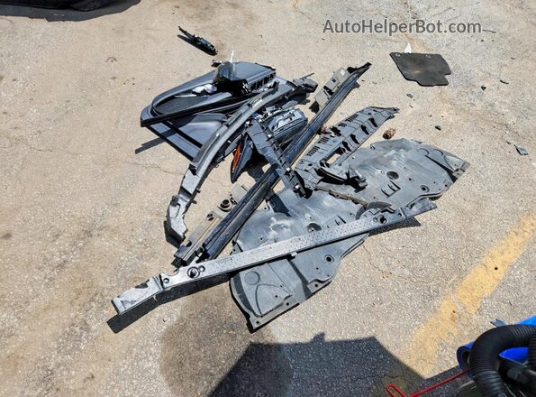 4T1DAACKXSU570662 2025 TOYOTA CAMRY Black Vista del compartimento del motor