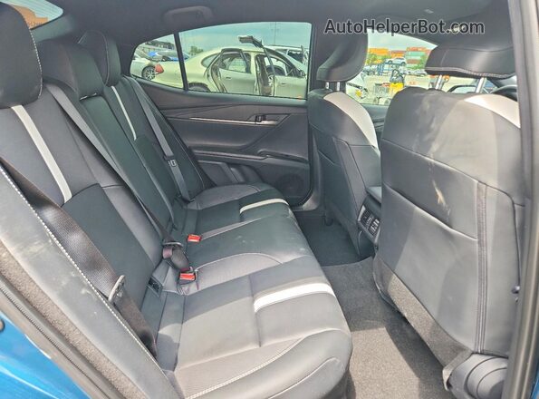 4T1DAACKXSU623568 2025 TOYOTA CAMRY Blue Vista de los asientos traseros