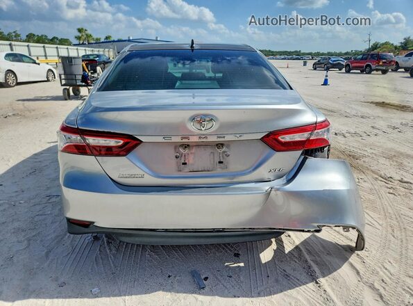 4T1F11AK4LU306057 2020 TOYOTA CAMRY Silver Հետևի տեսք
