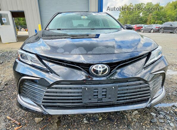 4T1R11BK2MU020334 2021 TOYOTA CAMRY Black Front view
