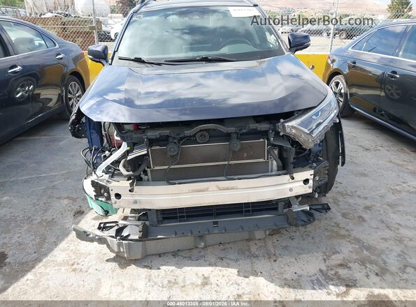 4T3D6RFV3MU023491 2021 TOYOTA RAV4 HYBRID Blue Rear interior view
