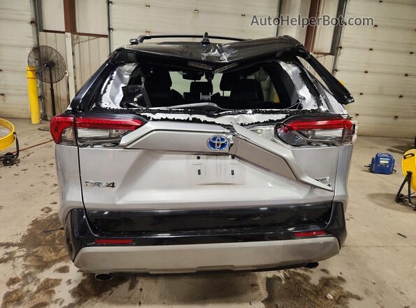 4T3E6RFV8NU094143 2022 TOYOTA RAV4 Silver Rear view