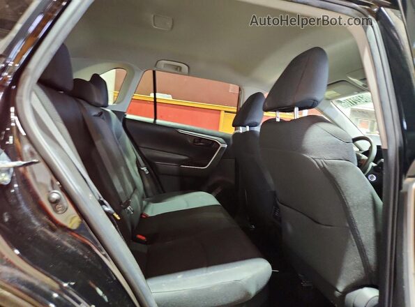 4T3LWRFV8PU097375 2023 TOYOTA RAV4 Red Widok wnętrza z tyłu
