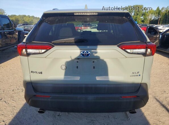 4T3RWRFV9NU069933 2022 TOYOTA RAV4 Gray Rear view