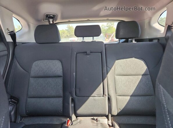 KM8J3CA22GU184515 2016 HYUNDAI TUCSON Blue Rear interior view