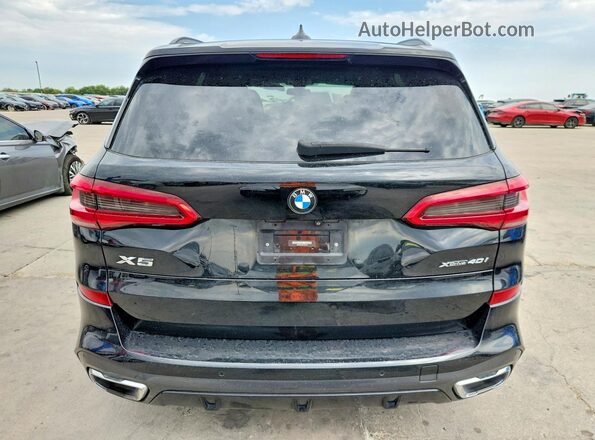 5UXCR6C08LLL65979 2020 BMW X5 Black Front interior view