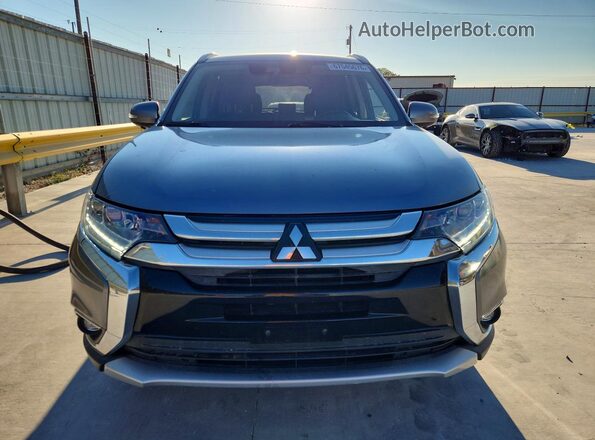JA4JZ4AX1JZ010296 2018 MITSUBISHI OUTLANDER Gray Rear view