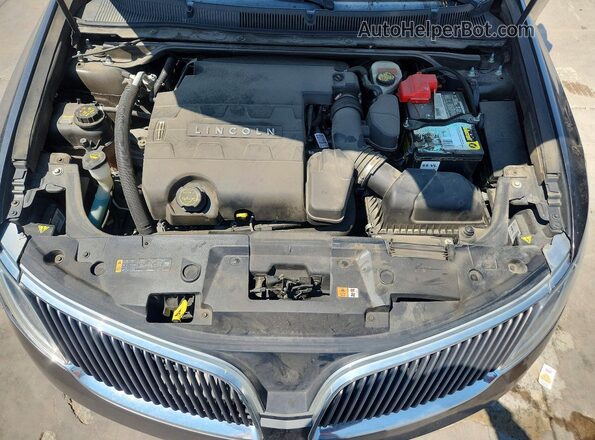 1LNHL9DK7GG603163 2016 LINCOLN MKS Gray ძრავის განყოფილების ხედი