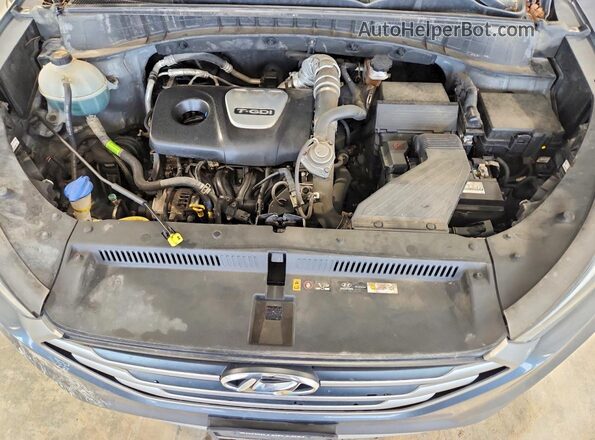 KM8J3CA20JU633259 2018 HYUNDAI TUCSON Gray Vista del compartimento del motor