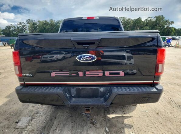 1FTEW1E53KFB97700 2019 FORD F150 Black Front interior view