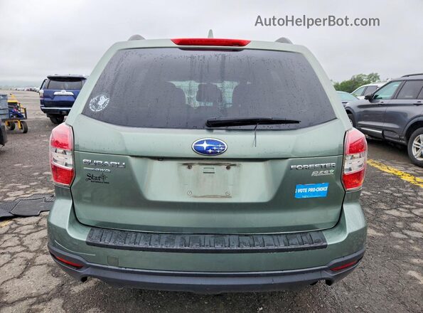 JF2SJADC2GH407007 2016 SUBARU FORESTER Green Front interior view