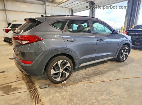 KM8J3CA20JU633259 2018 HYUNDAI TUCSON Gray Delantero derecho