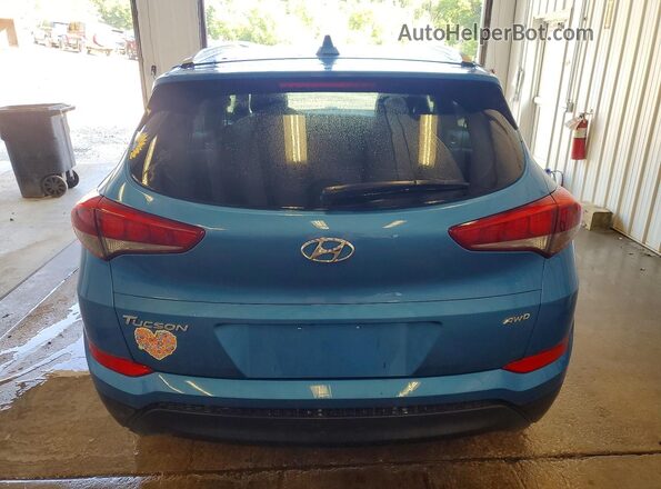 KM8J3CA48JU604903 2018 HYUNDAI TUCSON Синий Вид салона спереди