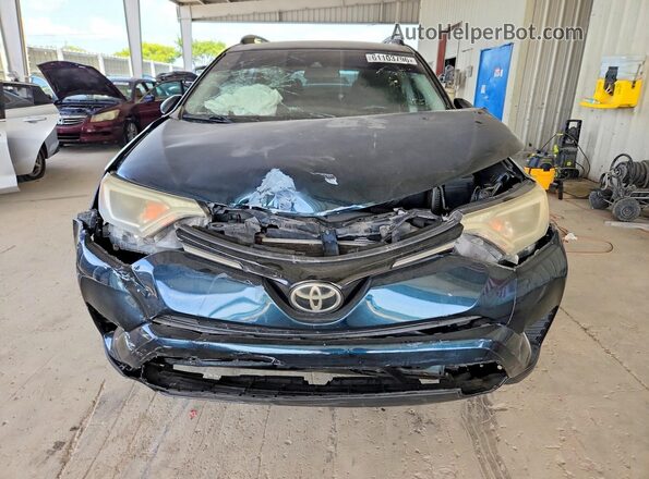 JTMZFREV7HJ127283 2017 TOYOTA RAV4 Blue Rear view