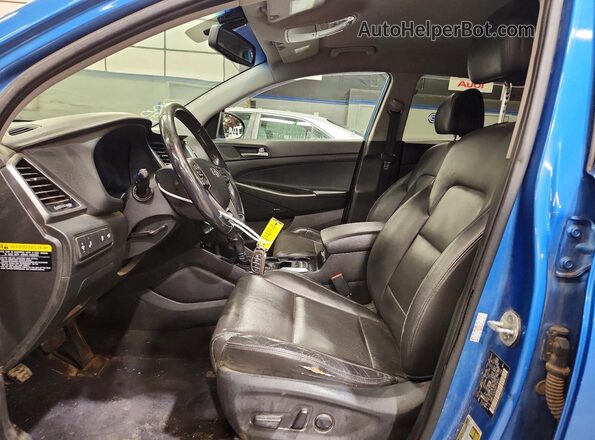 KM8J3CA20JU729232 2018 HYUNDAI TUCSON Blue Առջևի վահանակի տեսք