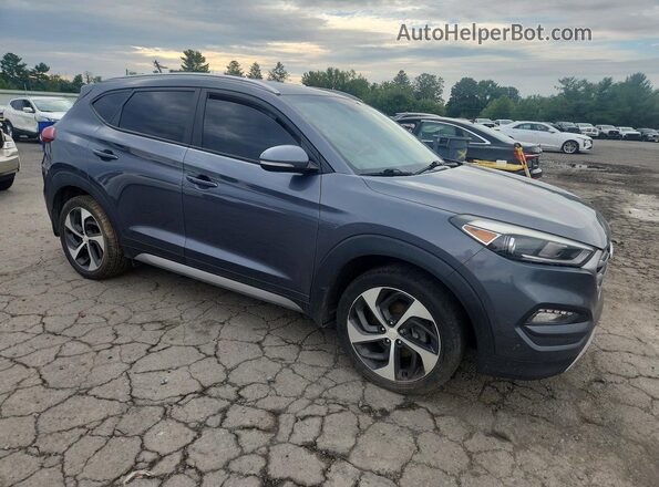KM8J3CA22HU265032 2017 HYUNDAI TUCSON Gray წინა ხედი
