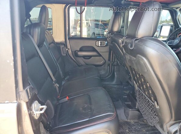 1C4HJXFG1JW305857 2018 JEEP WRANGLER Gray Vista interior trasera