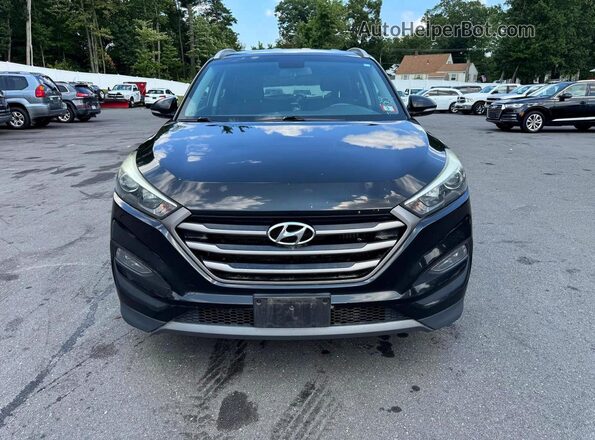 KM8J3CA25GU149712 2016 HYUNDAI TUCSON Black Widok z tyłu