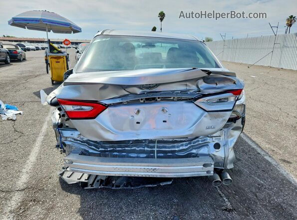 4T1B11HK9JU598306 2018 TOYOTA CAMRY Silver Front interior view