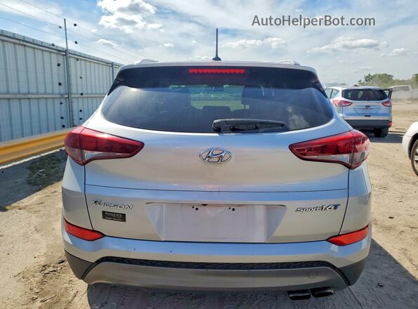 KM8J33A24GU060519 2016 HYUNDAI TUCSON Silver Vista interior delantera