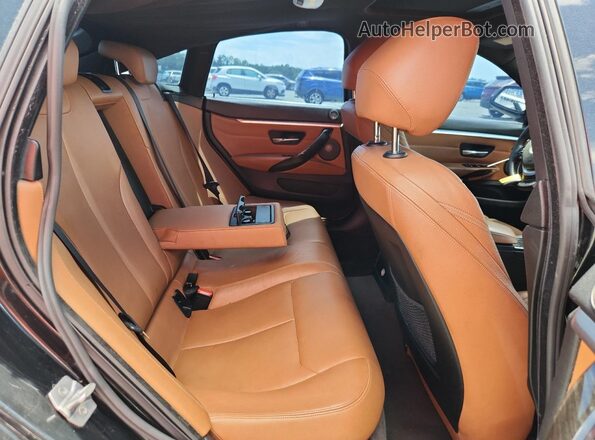 WBA4A9C5XGG506136 2016 BMW 4 SERIES Black Widok wnętrza z tyłu