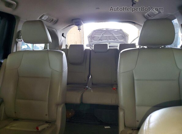 5FNRL5H67GB049583 2016 HONDA ODYSSEY Maroon Vista de los asientos traseros