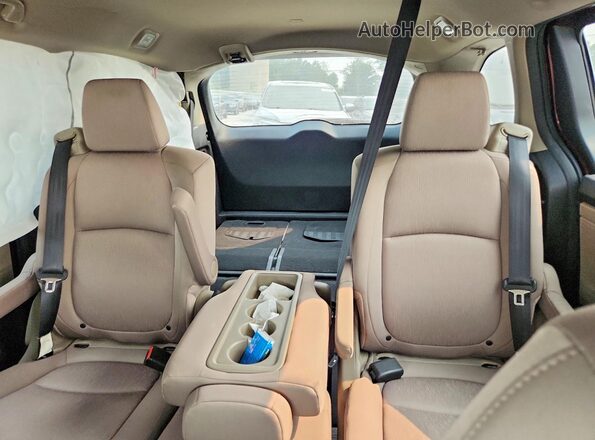 5FNRL6H51JB021539 2018 HONDA ODYSSEY Red Rear seats view