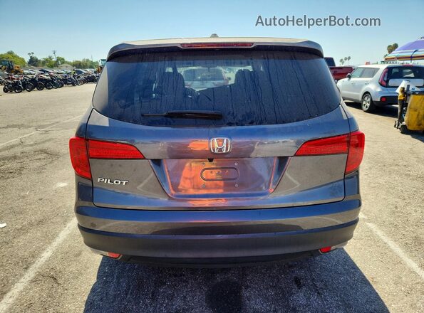 5FNYF5H33JB020114 2018 HONDA PILOT Blue Rear view