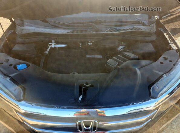 5FNYF5H57JB006413 2018 HONDA PILOT Black Rear interior view