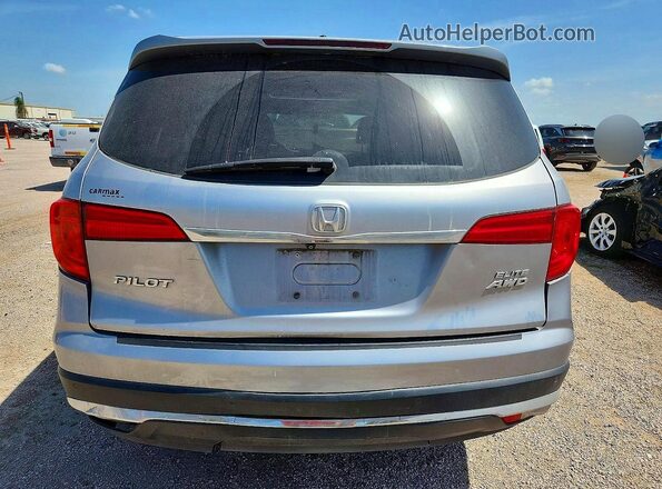 5FNYF6H09HB084776 2017 HONDA PILOT Silver Rear view