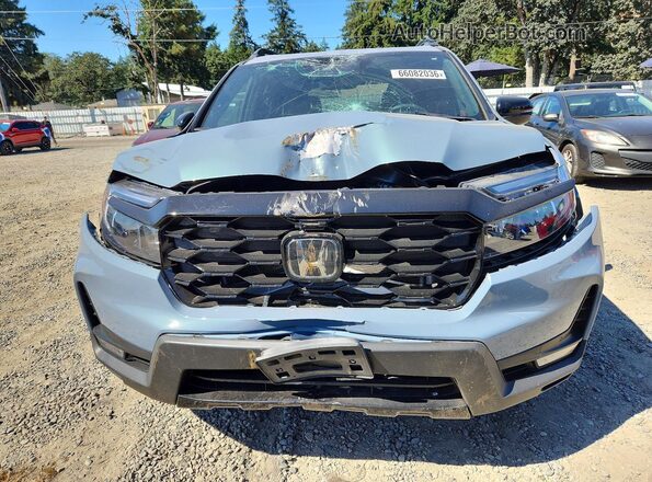 5FNYF8H09PB023373 2023 HONDA PASSPORT Blue Vista frontal