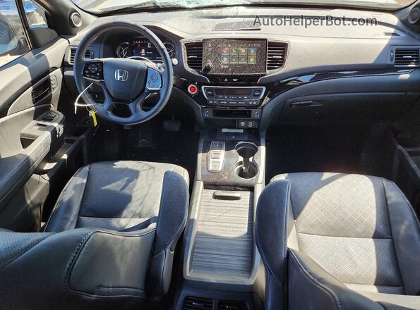 5FNYF8H09PB023373 2023 HONDA PASSPORT Blue Vista del salpicadero