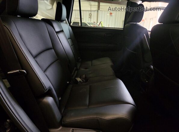5FNYF8H50PB033012 2023 HONDA PASSPORT Black Widok wnętrza z tyłu