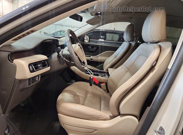 5LM5J7XC7RGL06072 2024 LINCOLN AVIATOR Желто-коричневый Вид салона спереди