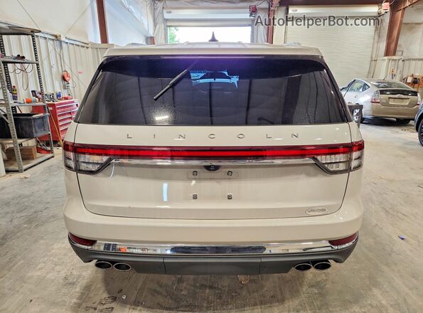 5LM5J7XC7RGL06072 2024 LINCOLN AVIATOR Желто-коричневый Вид сзади