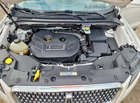 5LMCJ1D95KUL26549 2019 LINCOLN MKC White Engine compartment view
