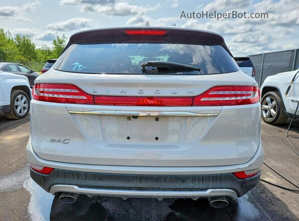 5LMCJ1D99KUL00679 2019 LINCOLN MKC Кремовый Вид сзади