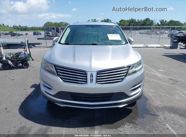 5LMCJ2C94JUL30369 2018 LINCOLN MKC Серебряный Вид панели приборов