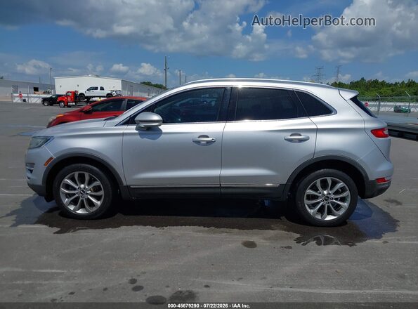 5LMCJ2C94JUL30369 2018 LINCOLN MKC Серебряный Вид задней части салона