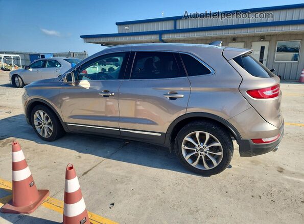 5LMCJ2C99KUL34645 2019 LINCOLN MKC Tan Trasero izquierdo