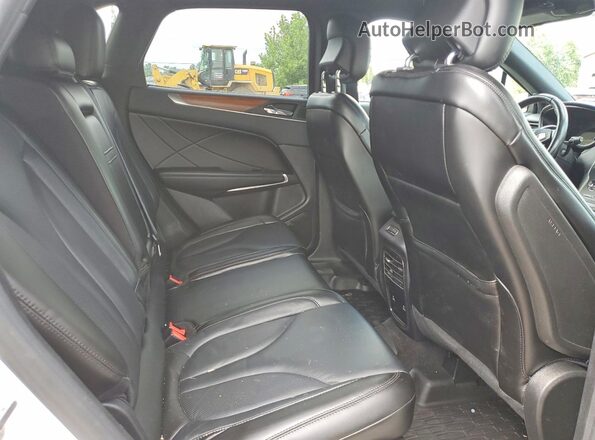 5LMCJ2D97KUL37901 2019 LINCOLN MKC White უკანა სალონის ხედი