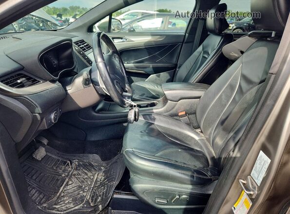 5LMCJ2D9XGUJ02884 2016 LINCOLN MKC Tan Вид панелі приладів