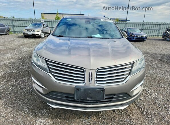 5LMCJ2D9XGUJ02884 2016 LINCOLN MKC Tan Вид спереду